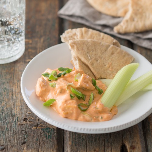 Slow Cooker Buffalo Chicken Dip with Celery and Pita | Reynolds Brands