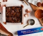 Bacon Bourbon Brownies in a square parchment lined pan