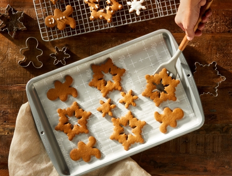 gingerbread cookies on parchment paper