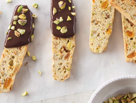 Chocolate dipped biscotti with pistachio sprinkles