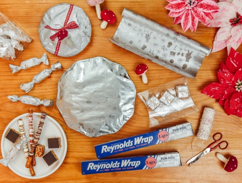 Holiday candies and plates covered in Reynolds Wrap Fun Foil