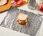 Sandwich laying on a sheet of Reynolds Wrap Fun Foil with embossed heart pattern